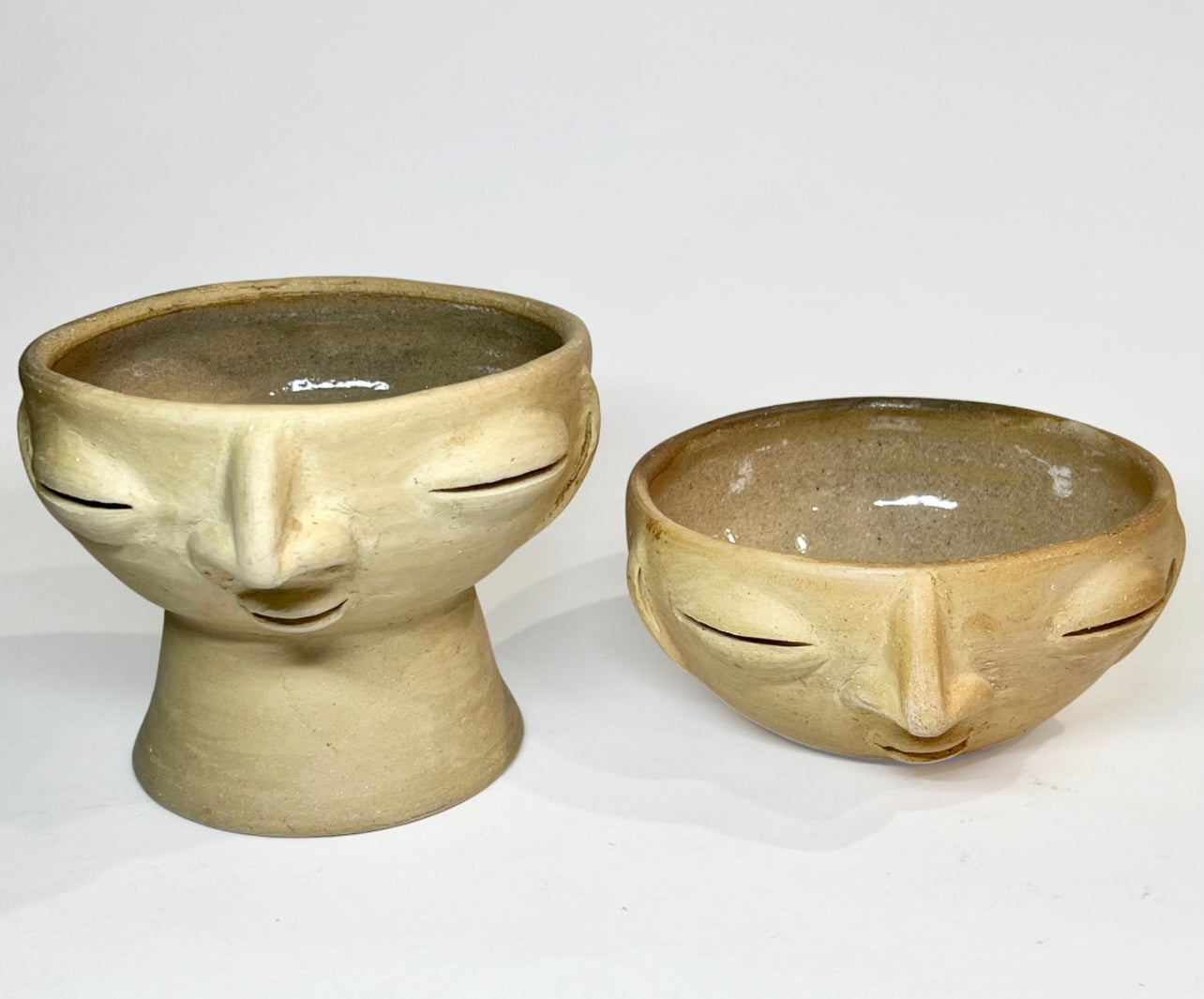 Tall White Face Pottery Bowl